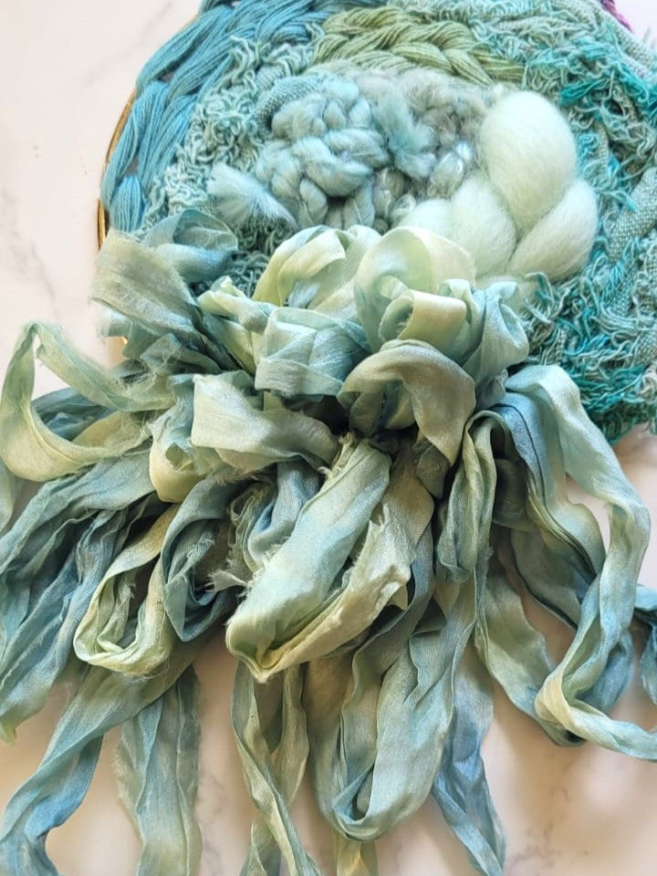 Art for Gaza | Shades of Blue and Green Weaving by Seespriya