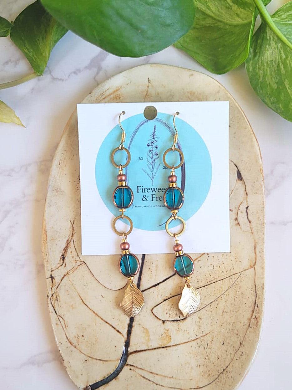 Art for Gaza | Teal Glass and Brass Dangle Earrings by Kate